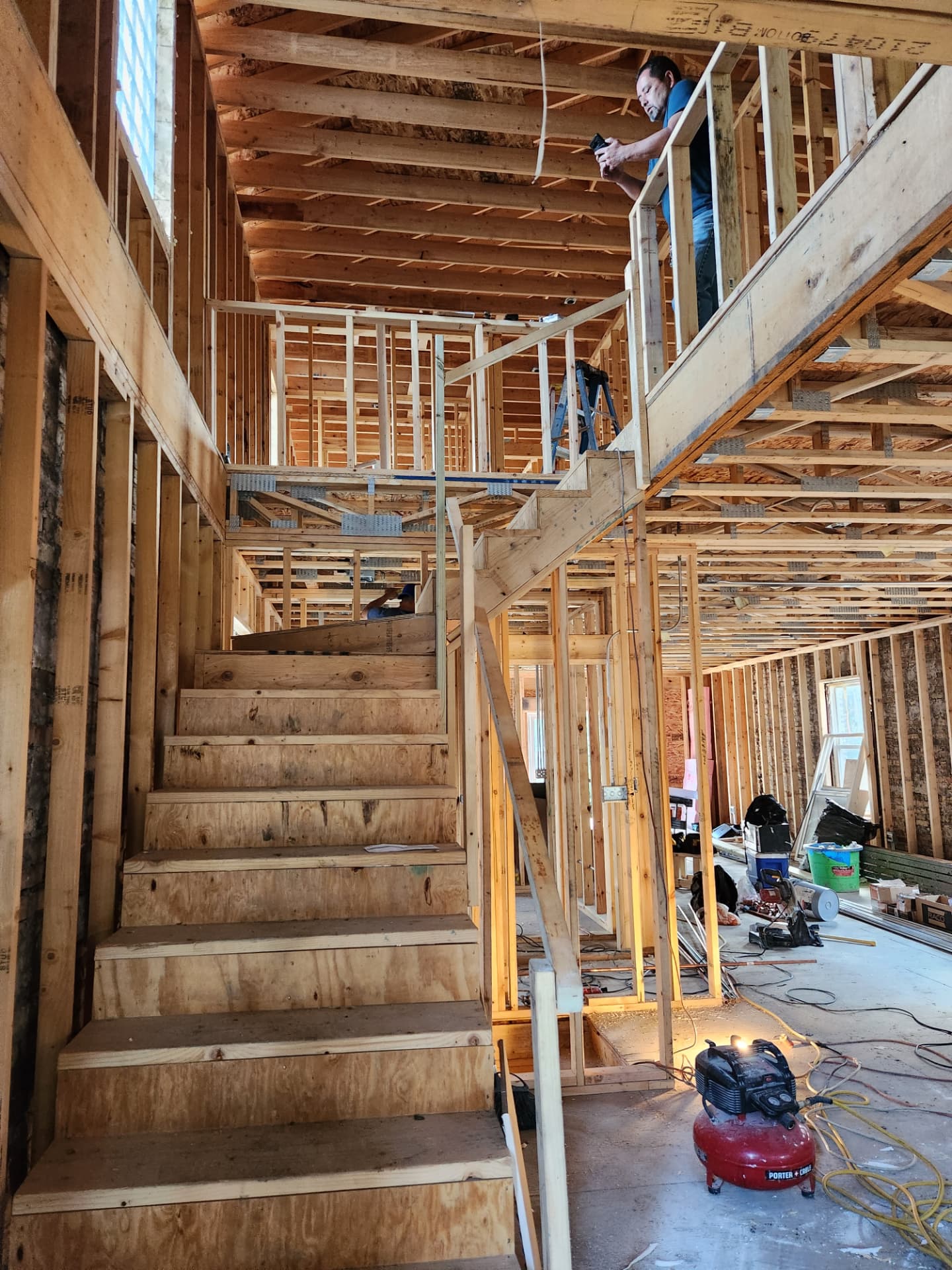 Interior framing with new staircase during a full home renovation